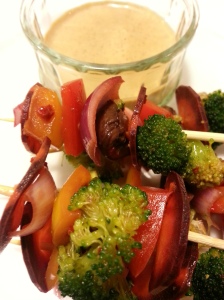 Marinated vegetables on skewers with almond chilli dipping sauce